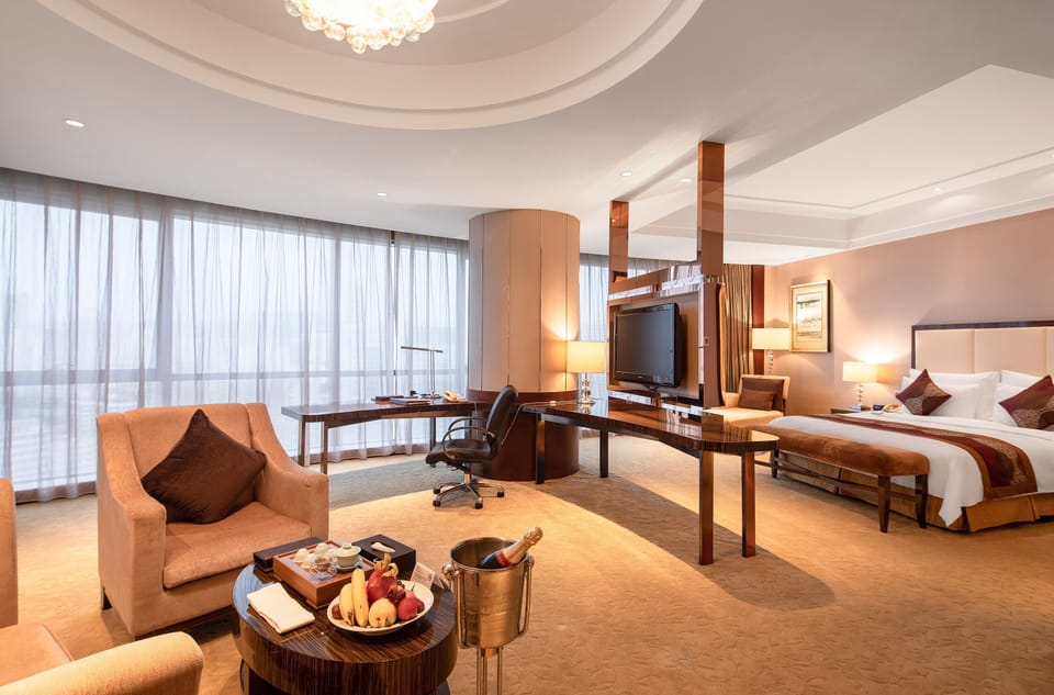 Deluxe Suite, Non Smoking | Living area | TV