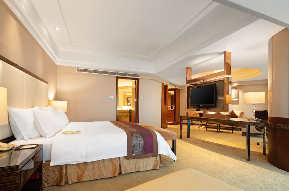 Superior Suite, Non Smoking | Minibar, in-room safe, desk, laptop workspace