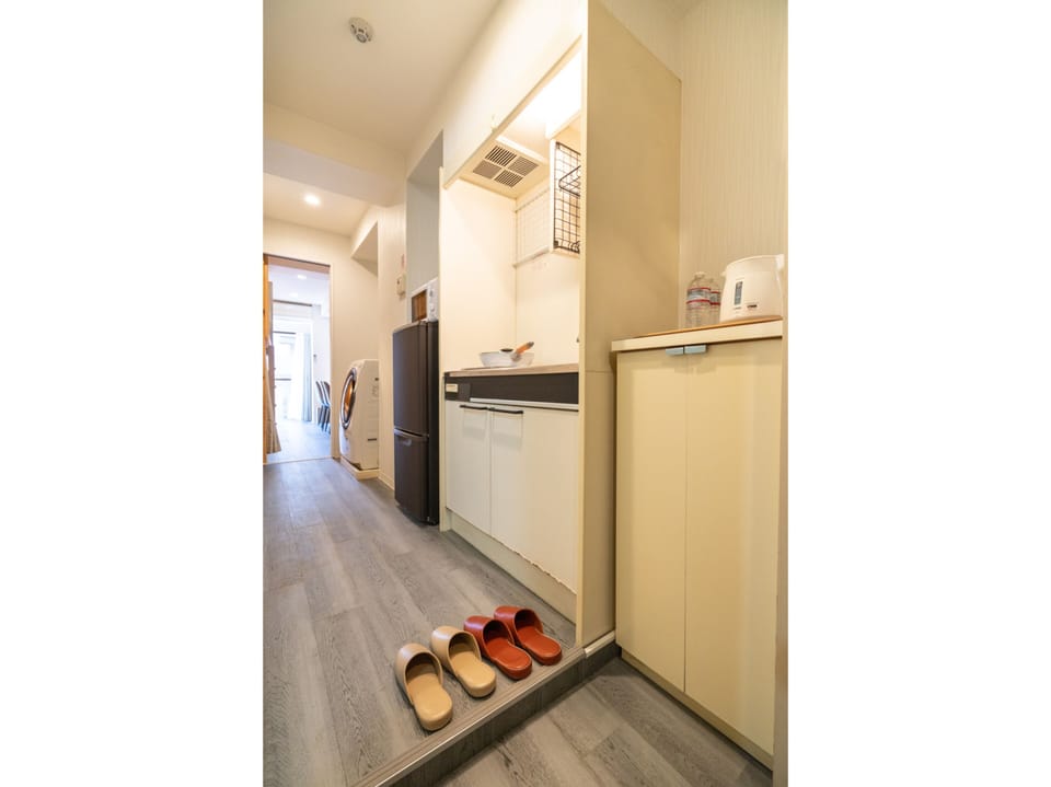 Signature Quadruple Room, Multiple Beds, Balcony, City View | Living area