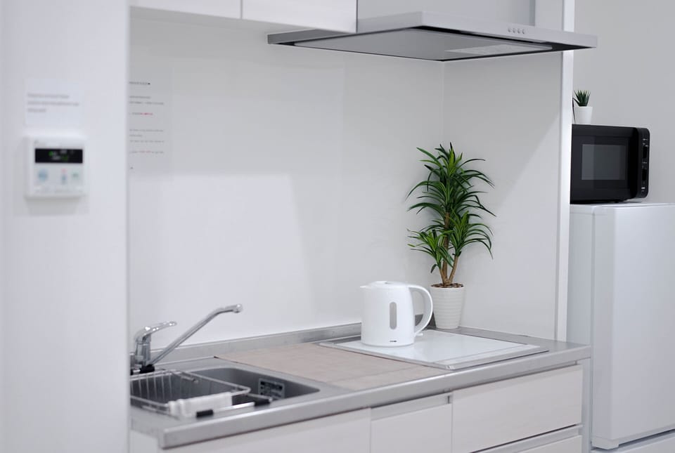 Mini-fridge, microwave, stovetop, electric kettle