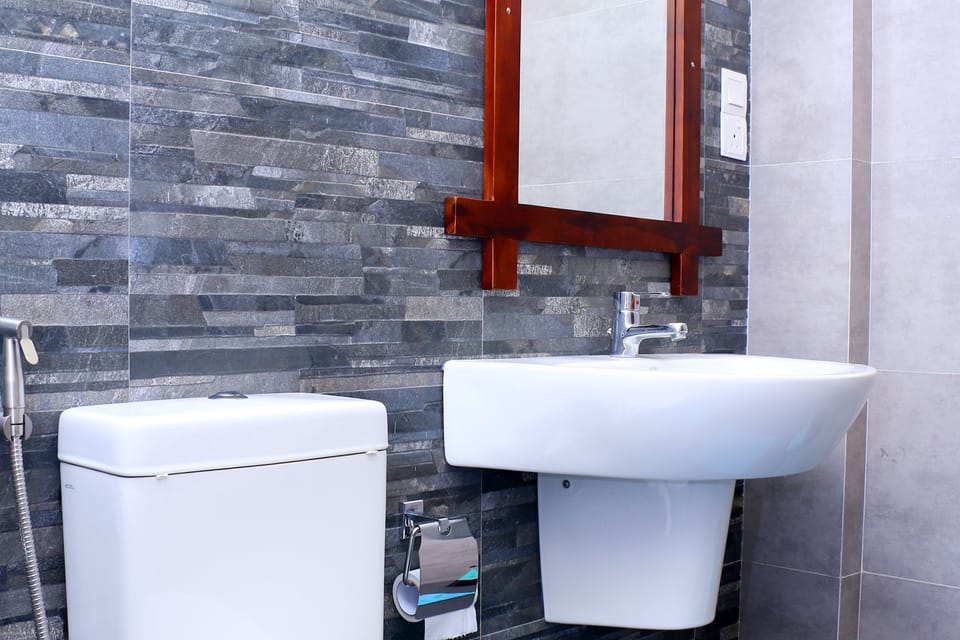 Deluxe Family Room With Balcony | Bathroom | Shower, free toiletries, hair dryer, bidet