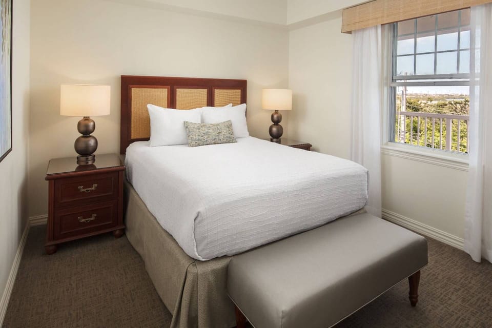 Guest bedroom features a queen size bed.