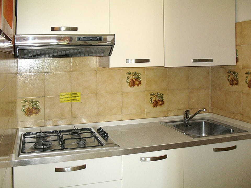 Countertop, Property, Kitchen, Room, Kitchen Sink, Tile, Cabinetry, Sink, Furniture, Floor