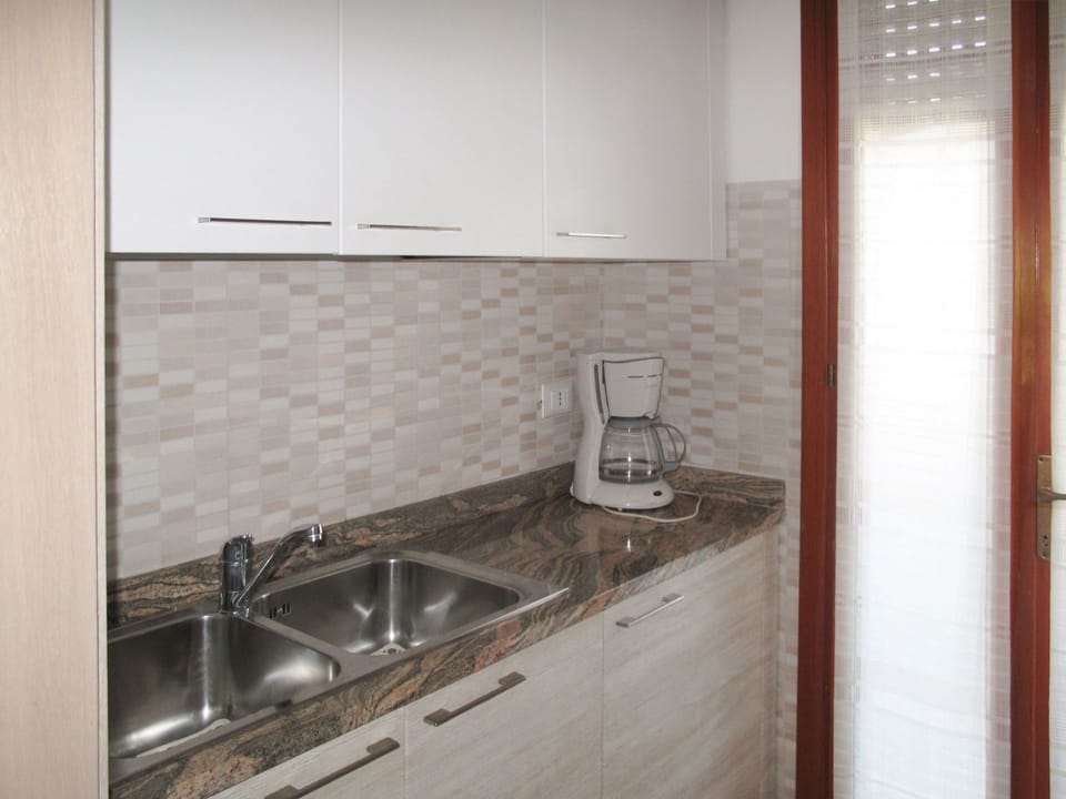 Property, Room, Countertop, Tile, Kitchen, Furniture, Sink, Cabinetry, Floor, Real Estate