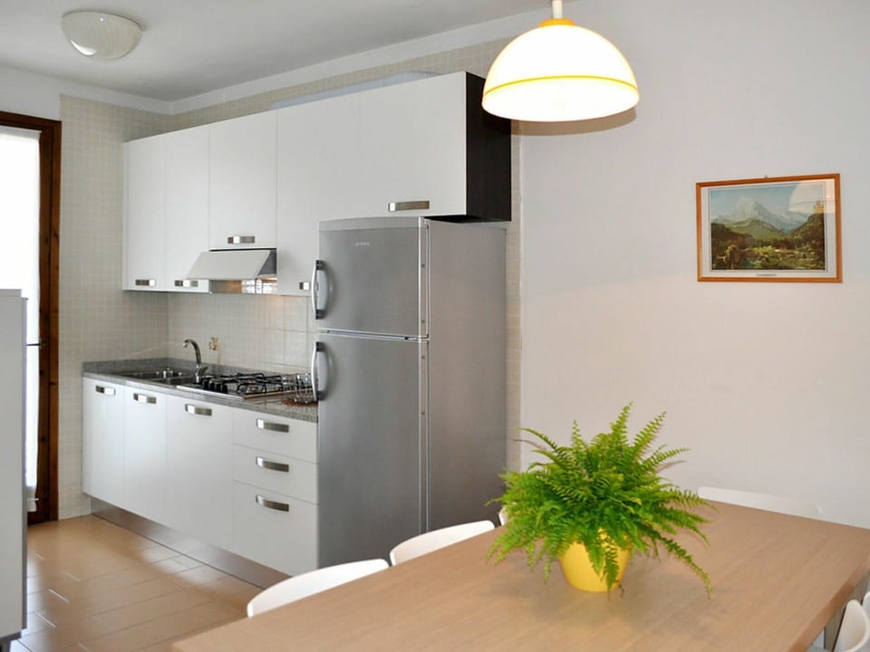 Room, White, Furniture, Property, Interior Design, Ceiling, Cabinetry, Floor, Yellow, Building