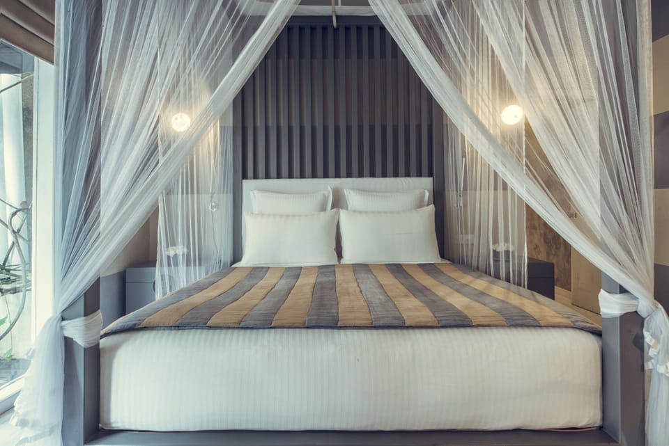 Superior Suite, 1 King Bed | Premium bedding, minibar, in-room safe, desk