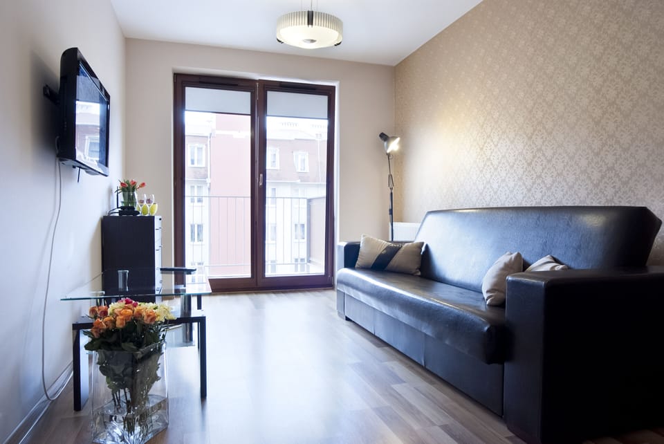 Apartment | Living area | 32-inch flat-screen TV with satellite channels, LCD TV