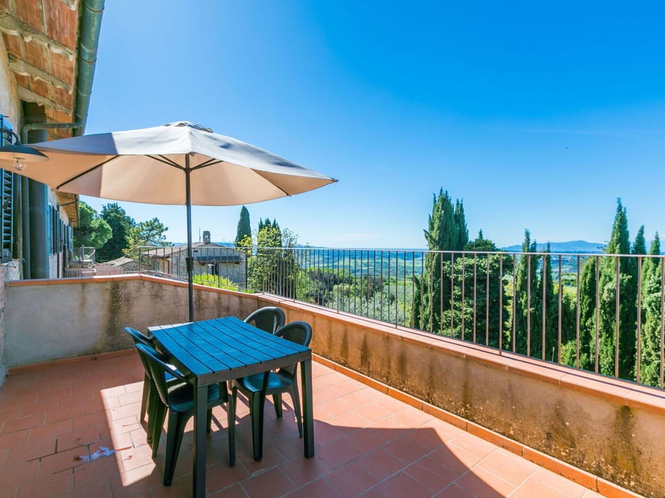 Sky, Table, Building, Property, Furniture, Plant, Azure, Shade, Outdoor Furniture, Interior Design