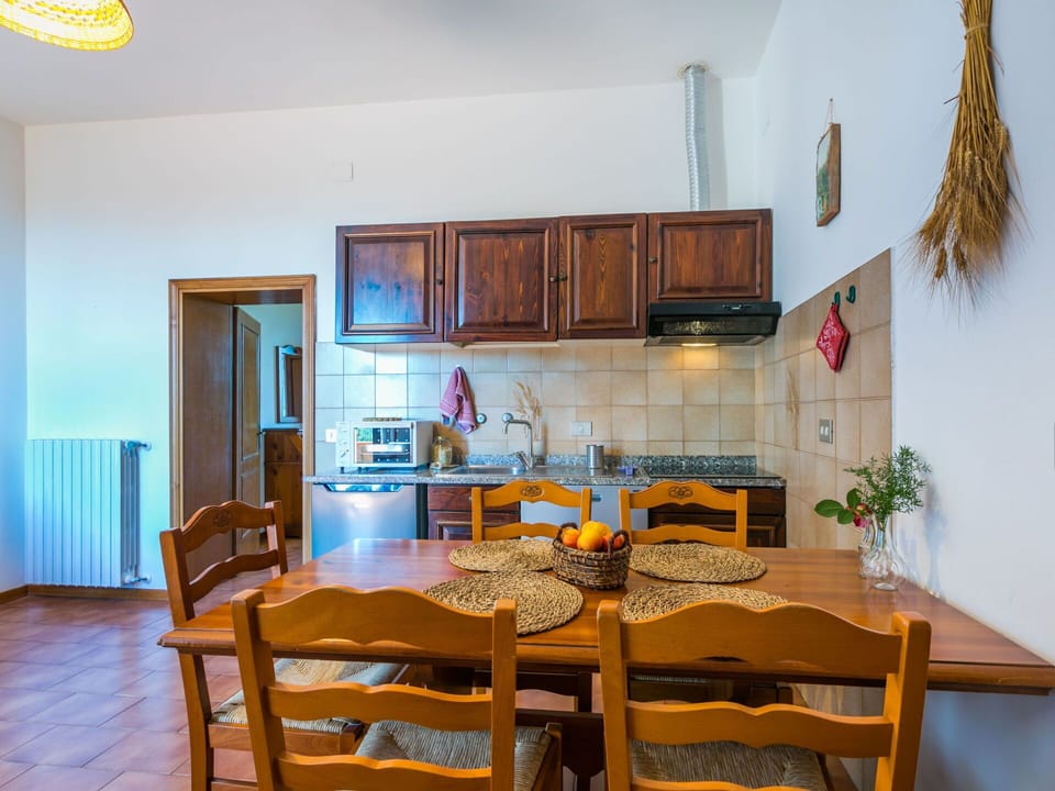 Table, Property, Cabinetry, Furniture, Countertop, Plant, Chair, Wood, Kitchen, Interior Design