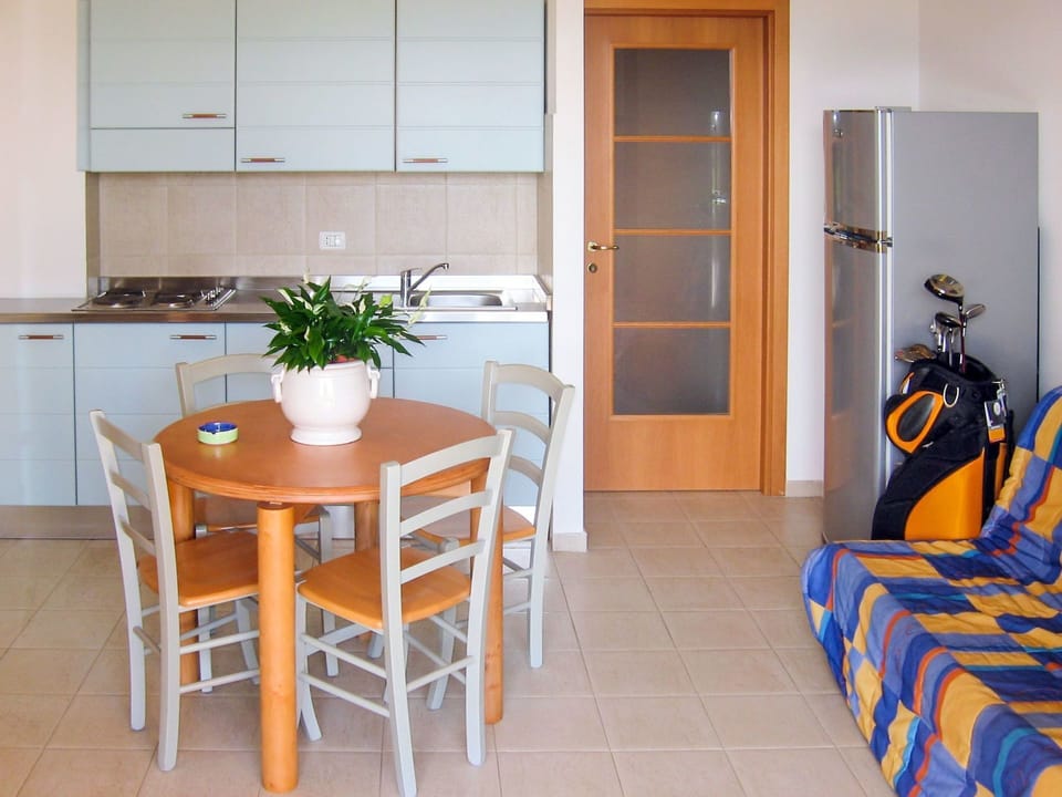 Room, Furniture, Property, Orange, Table, Building, Interior Design, Floor, House, Real Estate