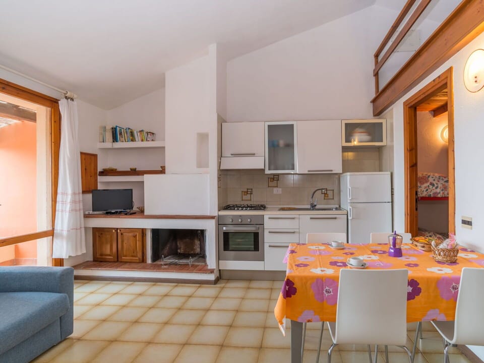 Furniture, Table, Cabinetry, Picture Frame, Countertop, Wood, Orange, Home Appliance, Chair, Building