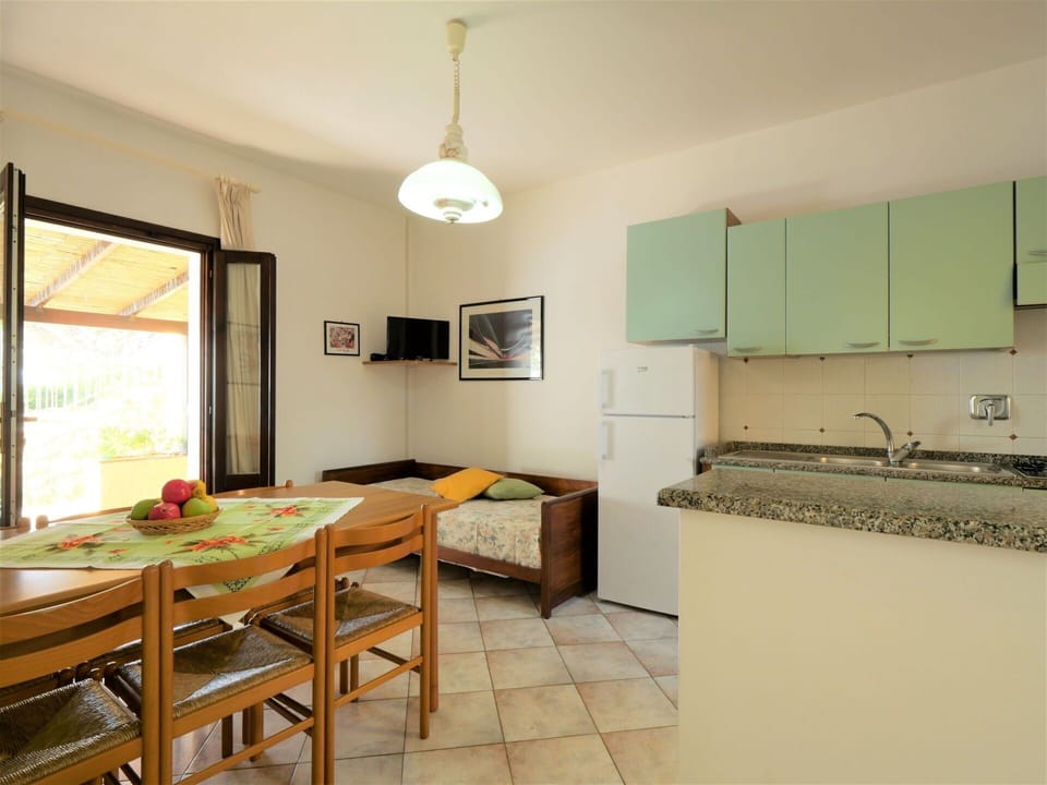 Furniture, Table, Cabinetry, Countertop, Kitchen, Window, Wood, Kitchen Stove, Chair, Flooring