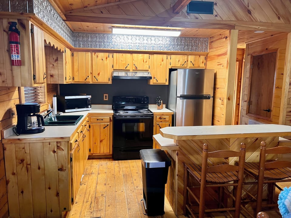 Fresh kitchen - removed wallpaper, new refrigerator and new paint