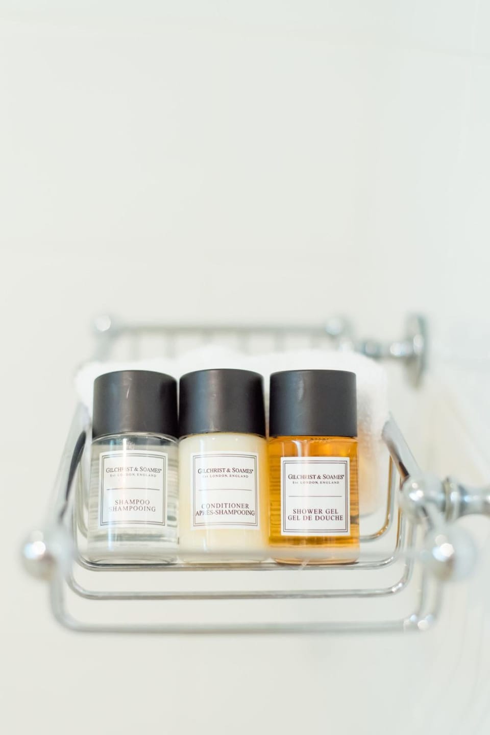 Designer toiletries, hair dryer, bathrobes, slippers