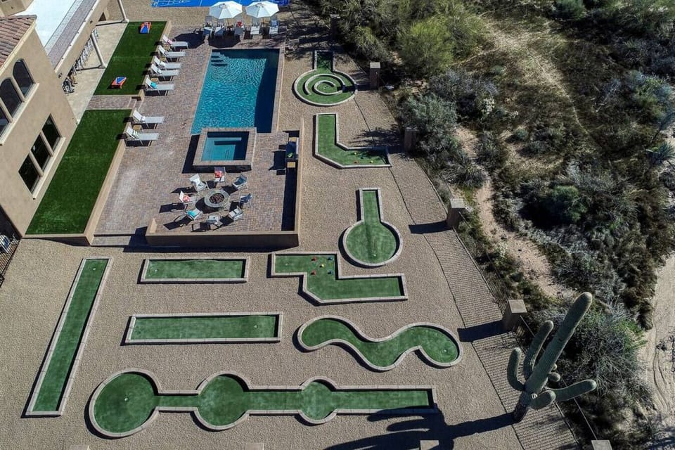 [Backyard] 9-hole Mini Golf course, large 12 person spa, resort-style pool, fire pit, and games