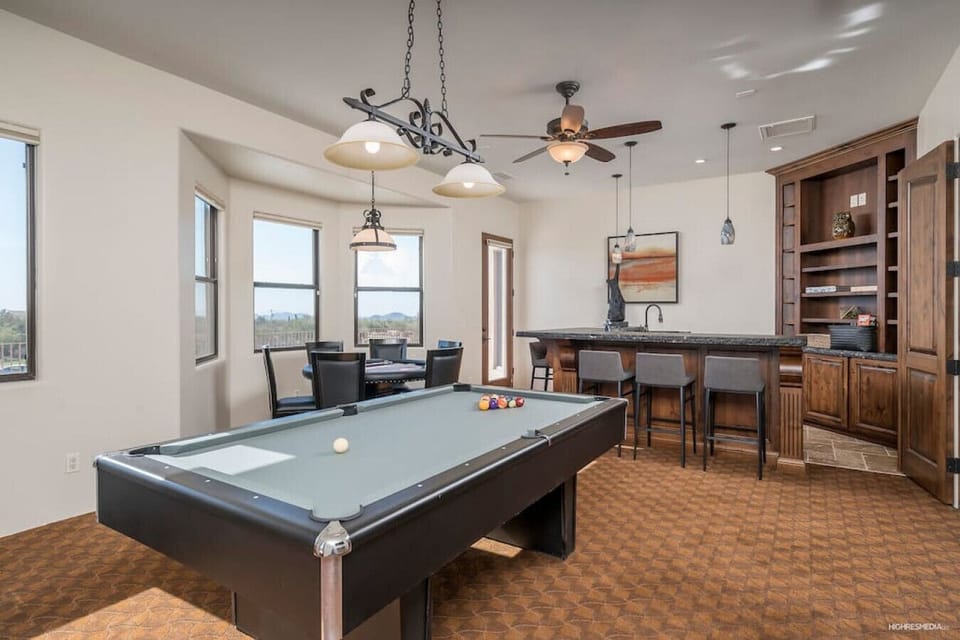 [Game Room] with a pool table, poker, and a wet bar