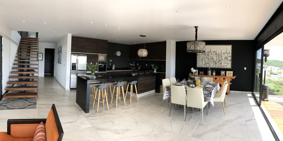 You have a big open concept, kitchen, dining, living room and terrace together