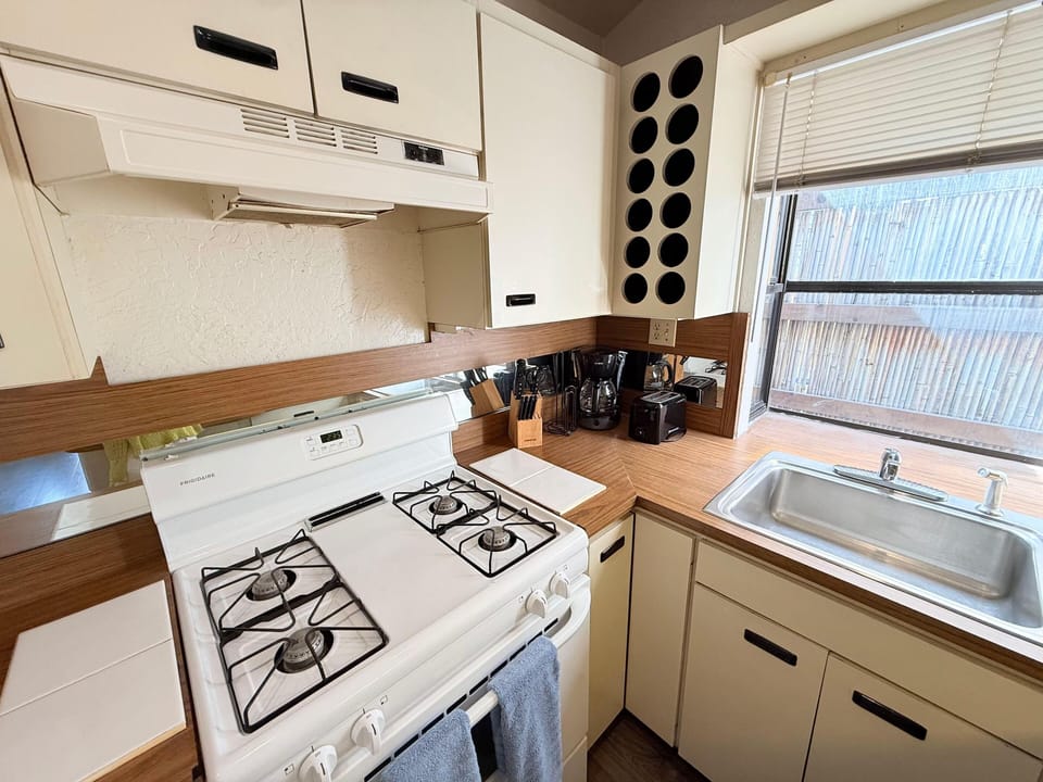 Cozy kitchen with vintage charm and ample natural light