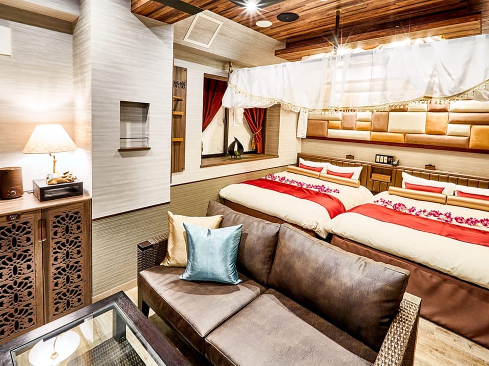 Quadruple Room, Smoking (Loyal Theater Type) | Down comforters, desk, laptop workspace, blackout drapes