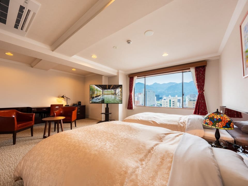 Premium Floor Deluxe Twin Room - Non-Smoking | In-room safe, iron/ironing board (on request), WiFi (free)