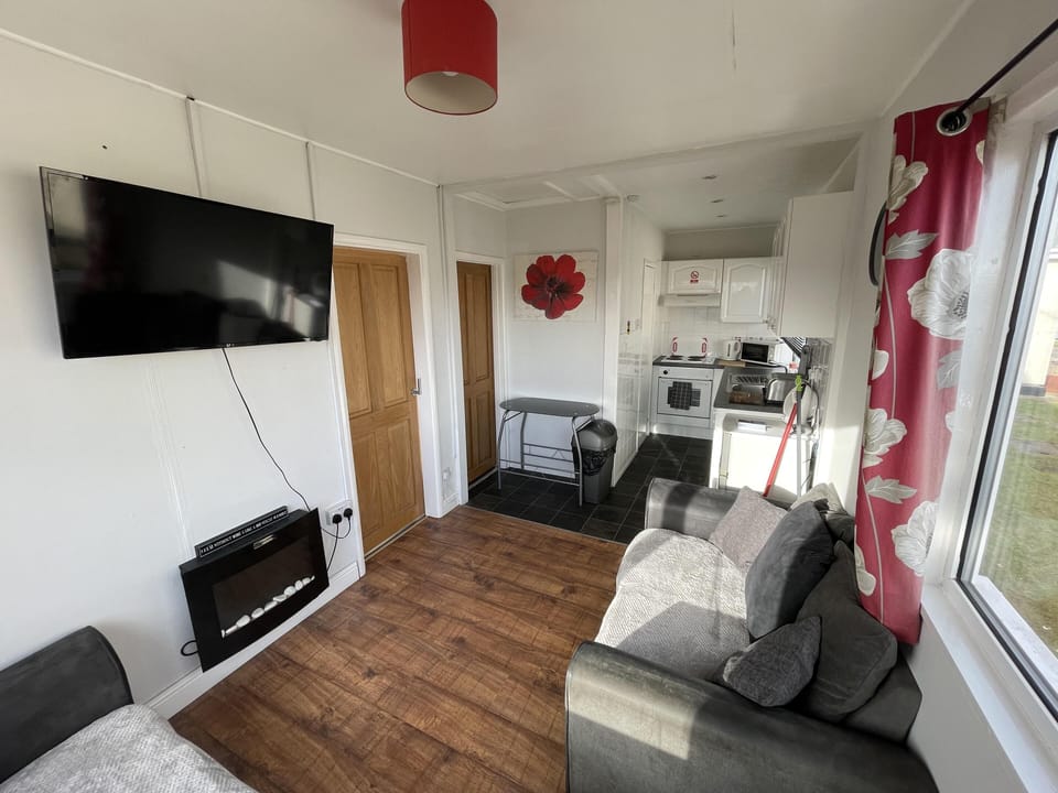 Chalet | Living area | 30-inch TV with cable channels