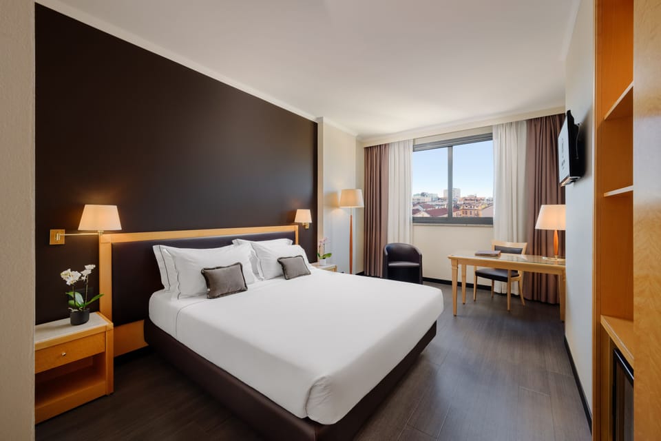 Executive Room | Premium bedding, down comforters, minibar, in-room safe