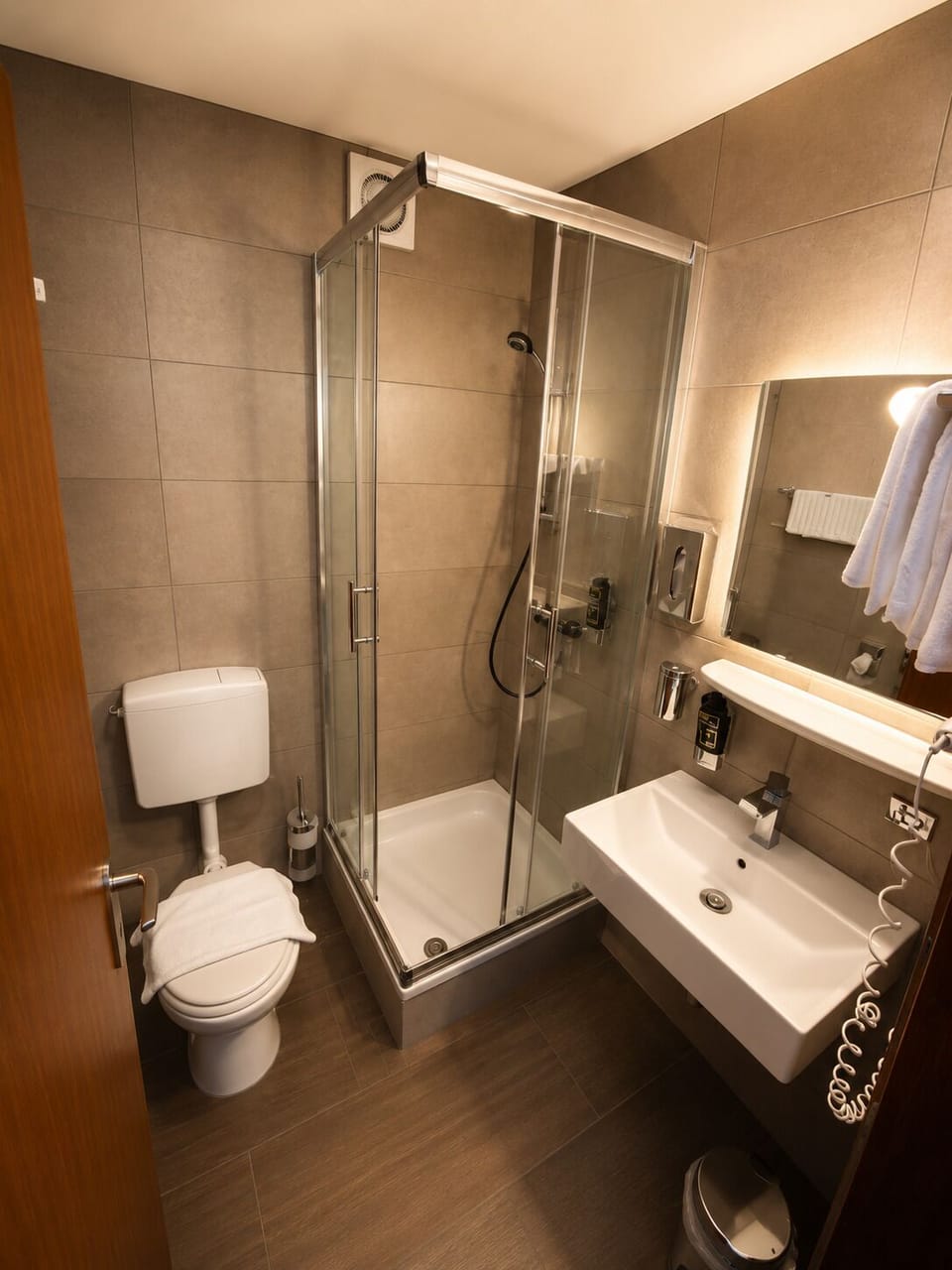 Shower, free toiletries, hair dryer, towels