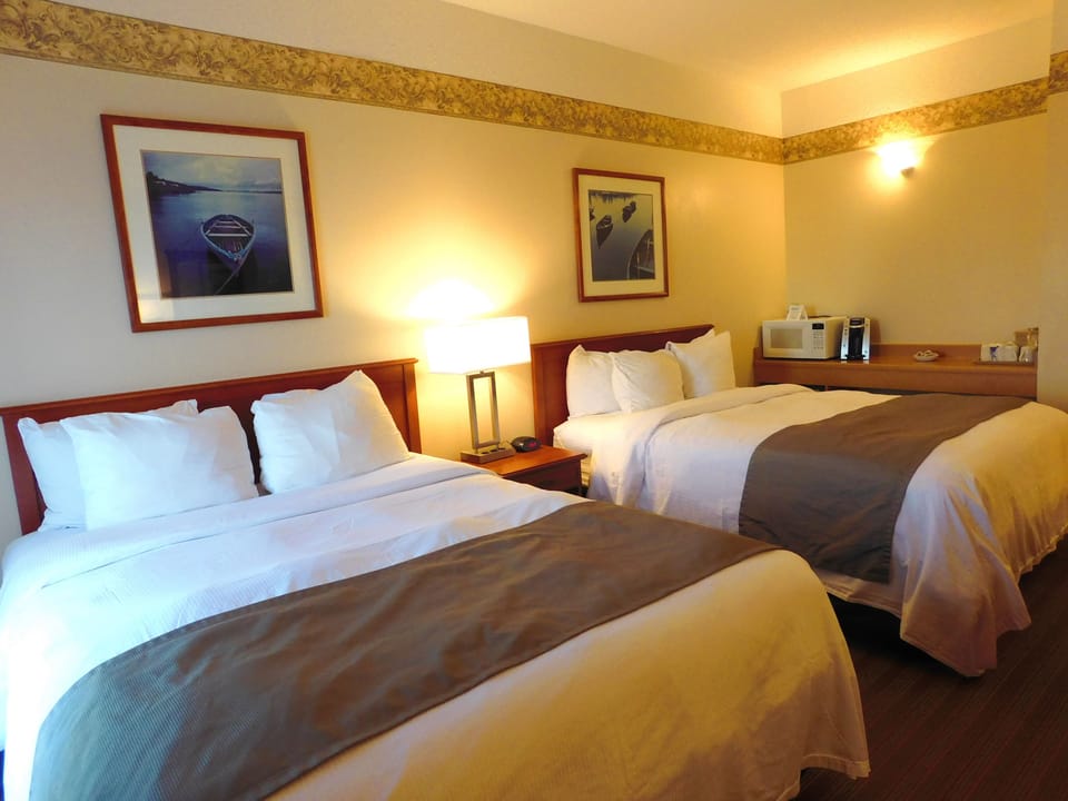 Standard Room, 2 Queen Beds | Blackout drapes, iron/ironing board, free WiFi, bed sheets