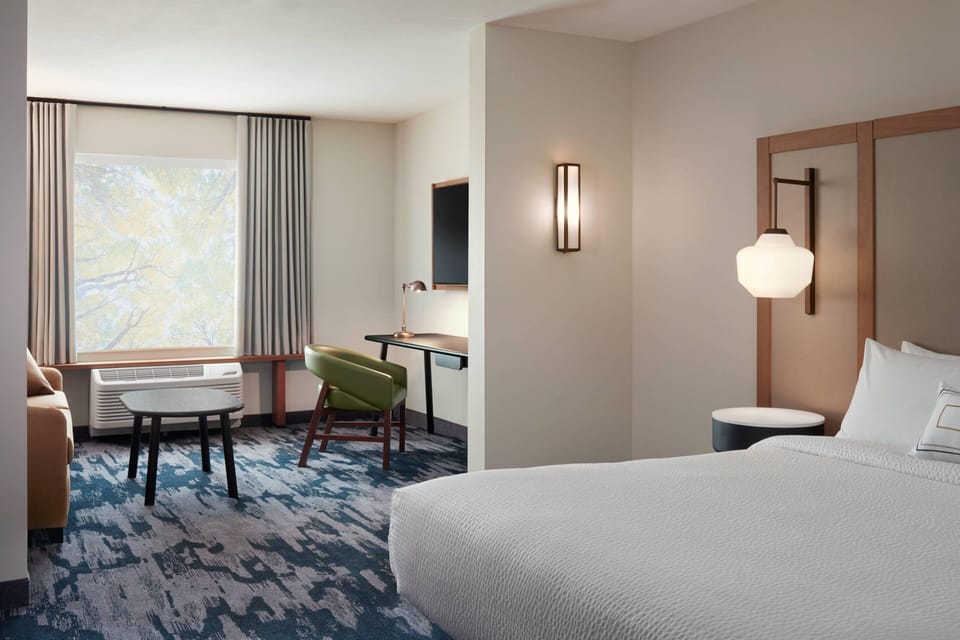 Suite, 1 King Bed with Sofa bed | 1 bedroom, desk, laptop workspace, bed sheets