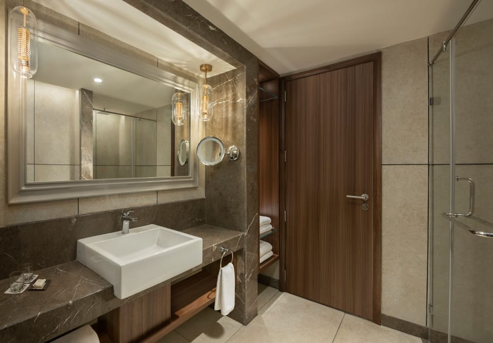 Shower, free toiletries, hair dryer, slippers