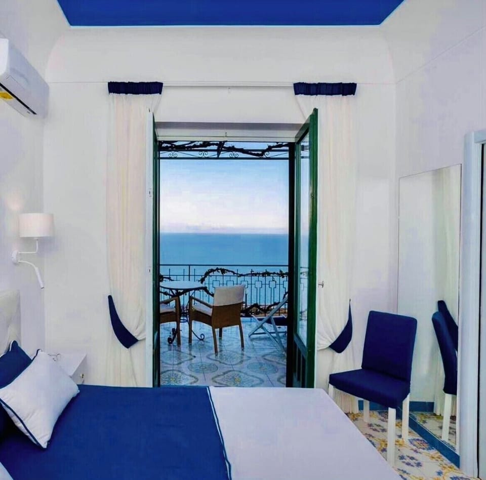 Standard Room, Terrace, Sea View | Minibar, iron/ironing board, free WiFi, bed sheets