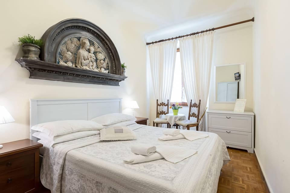Double Room, Private Bathroom (External) | Minibar, in-room safe, individually furnished, iron/ironing board