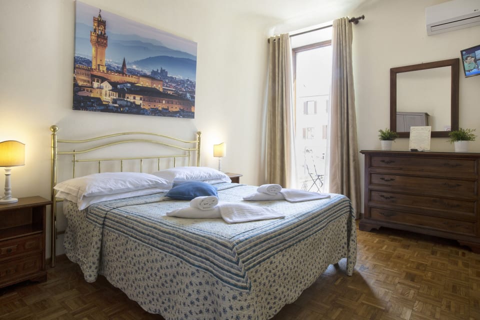 Superior Double Room, Private Bathroom (Duomo view) | Minibar, in-room safe, individually furnished, iron/ironing board