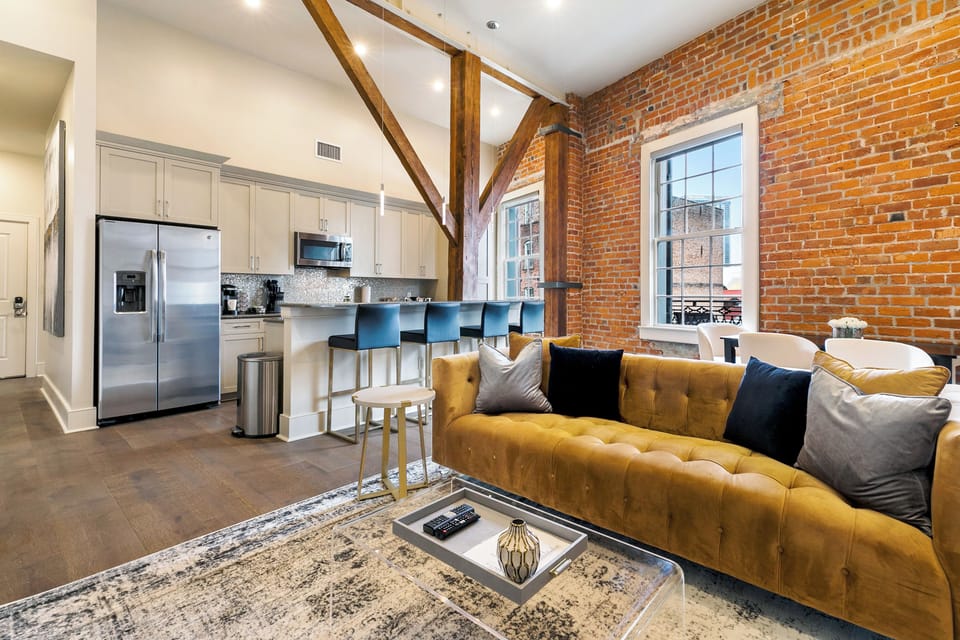 Open concept living, kitchen, dining area with lots of comfortable seating for you and your guests. 65” Samsung Smart 4K TV for streaming from your favorite apps, along with the DIRECTV. Dining table with seating for four. All the natural light too!