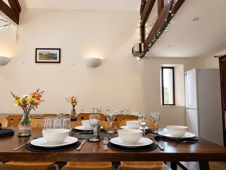 Large dining table for shared meals and celebrations.