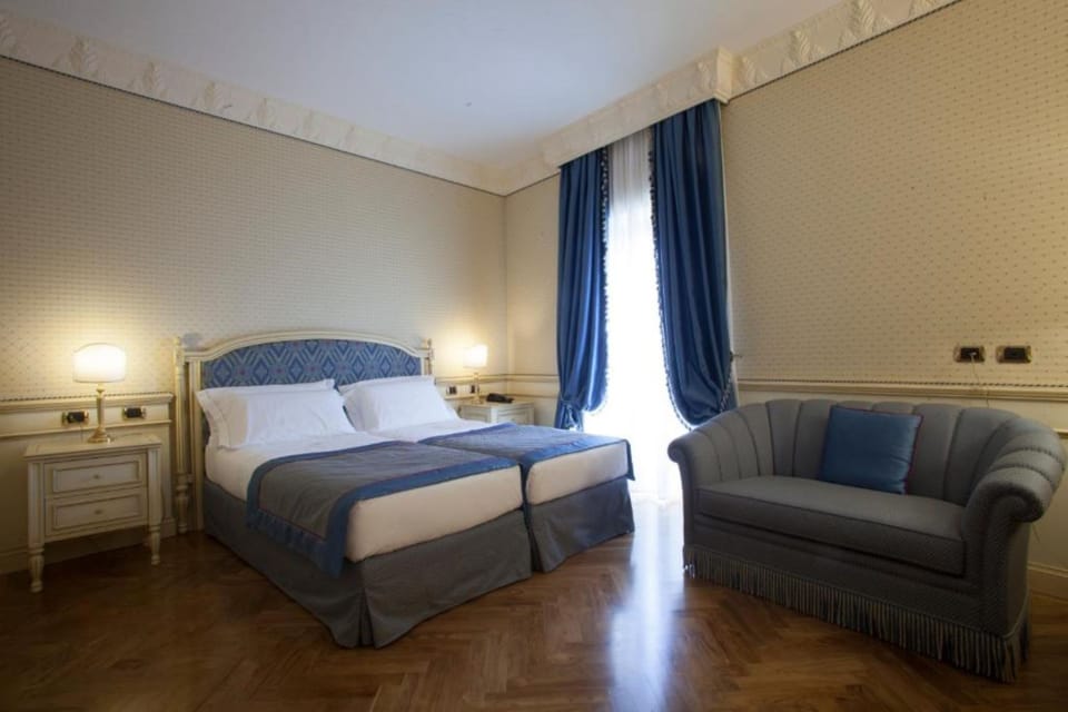 Premium bedding, down comforters, minibar, in-room safe