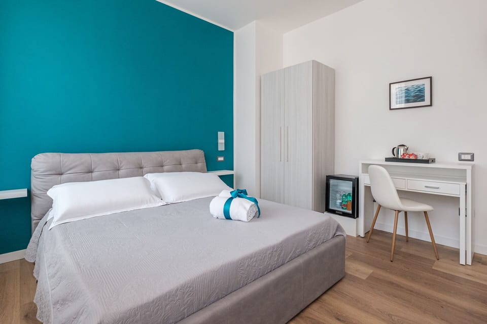 Deluxe Double Room | Minibar, desk, iron/ironing board, free WiFi