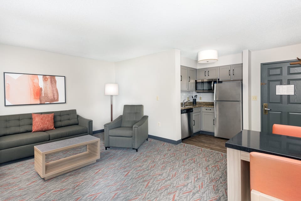 Desk, laptop workspace, blackout drapes, iron/ironing board