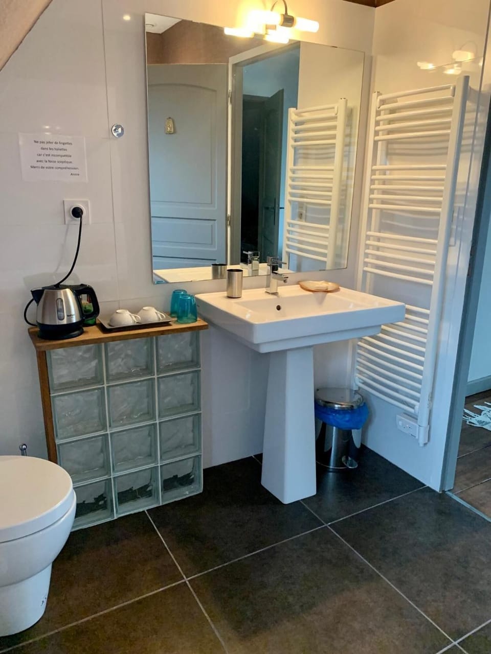 Designer toiletries, hair dryer, towels