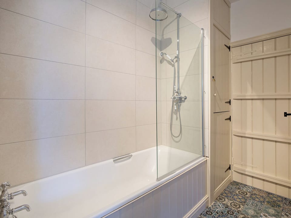 Bathroom with double shower over bath | Duck Cottage, Gargrave
