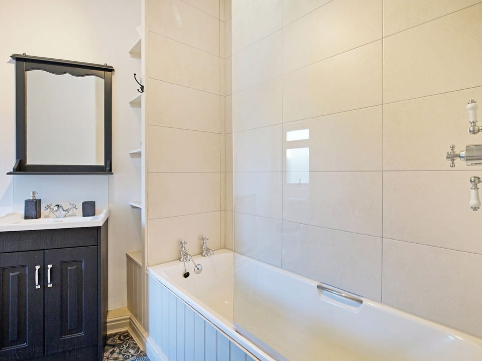 Bathroom with double shower over bath | Duck Cottage, Gargrave