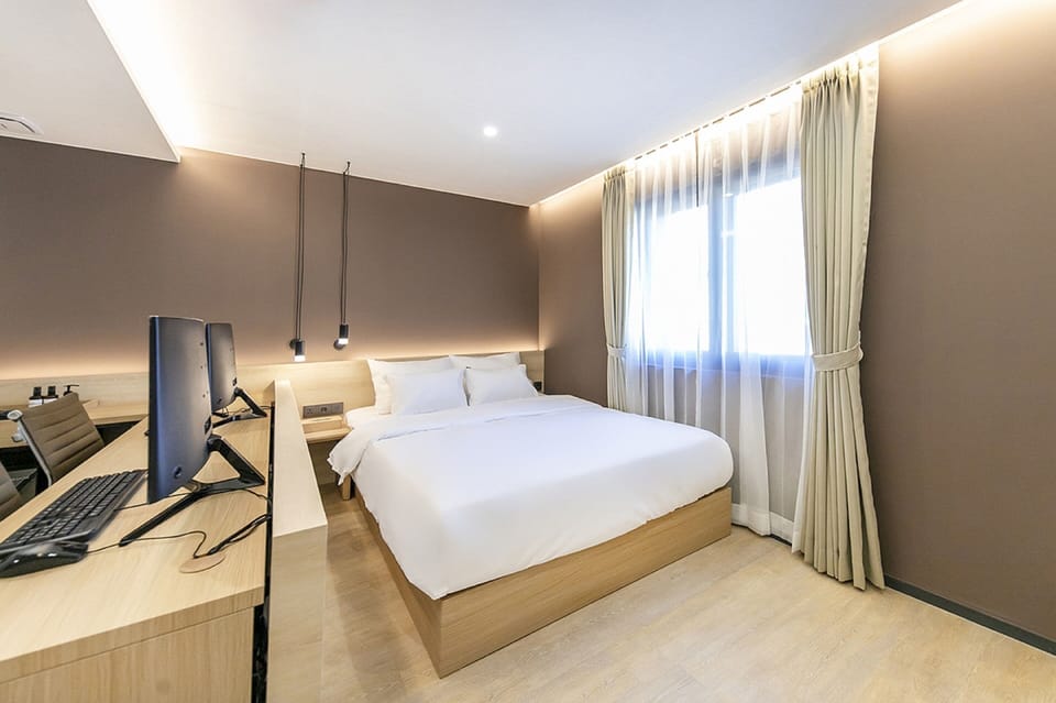 Premium bedding, down comforters, memory foam beds, desk