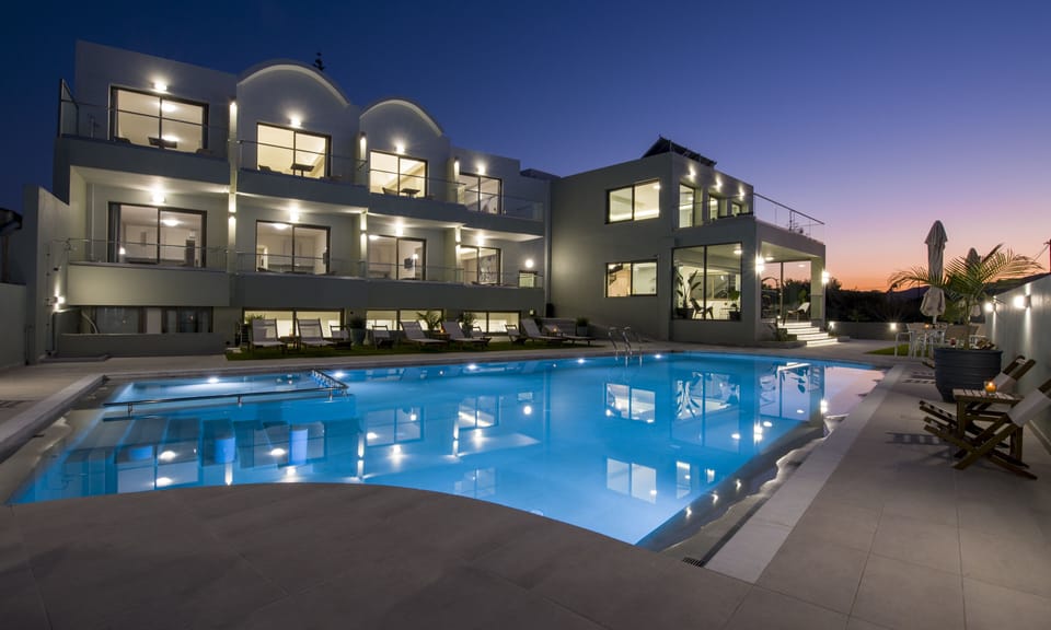 Seasonal outdoor pool, open 10:00 AM to 6:00 PM, pool umbrellas