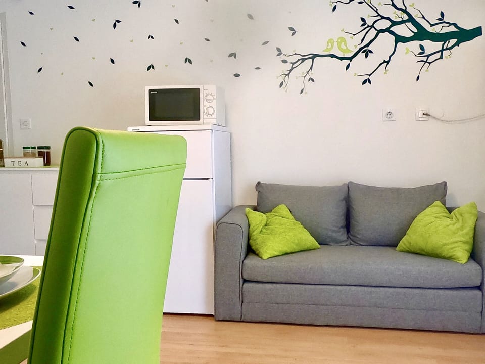 Design Apartment, 1 Bedroom, Park View | Living room | Flat-screen TV, table tennis