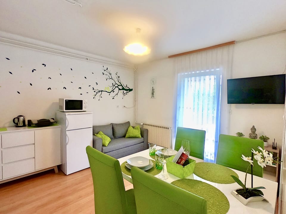 Design Apartment, 1 Bedroom, Park View | Living area | Flat-screen TV, table tennis