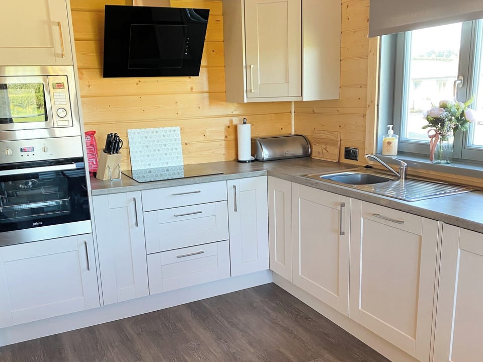 Typical kitchen | Cedar Lodge, Larch Lodge - Dale Garth Lodges, Mascalles, near Ulverston