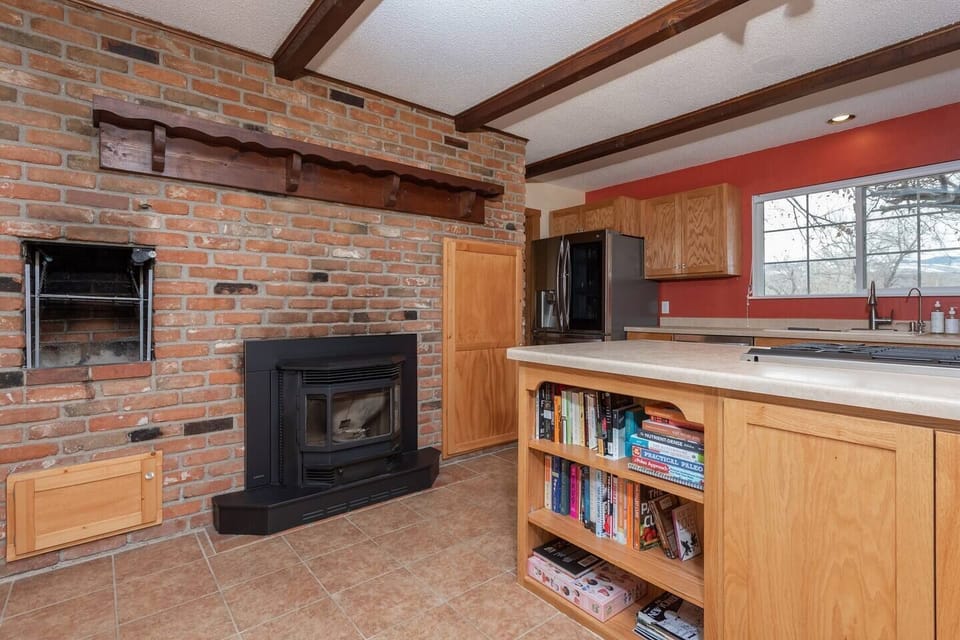 Two sided pellet fireplace that will not only warm you up but the entire home as well.