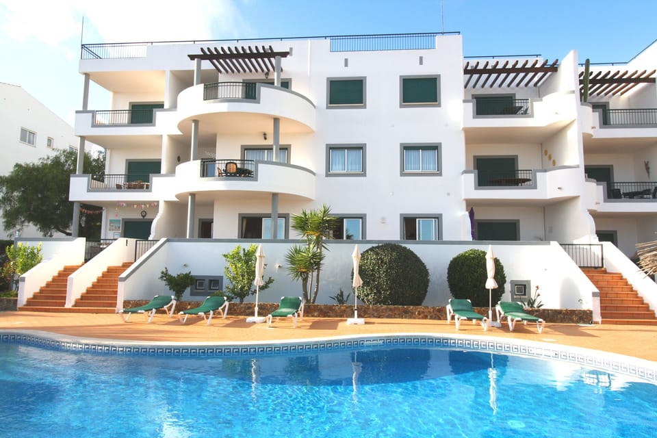 Terrace overlooks pool area and has view of Black Rock and a small sea view