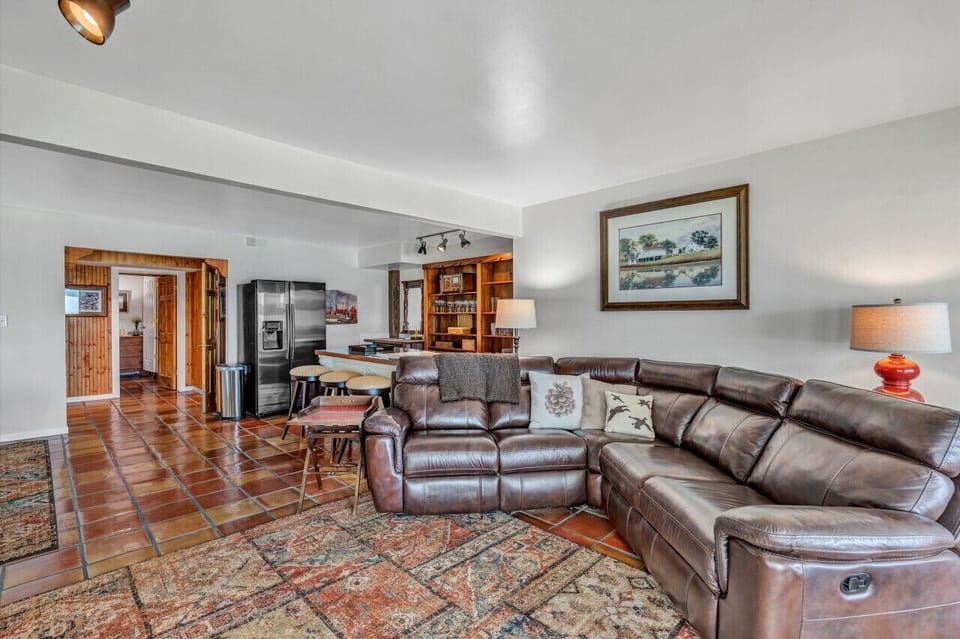 Enjoy family movie night in our den on this comfy sofa.
