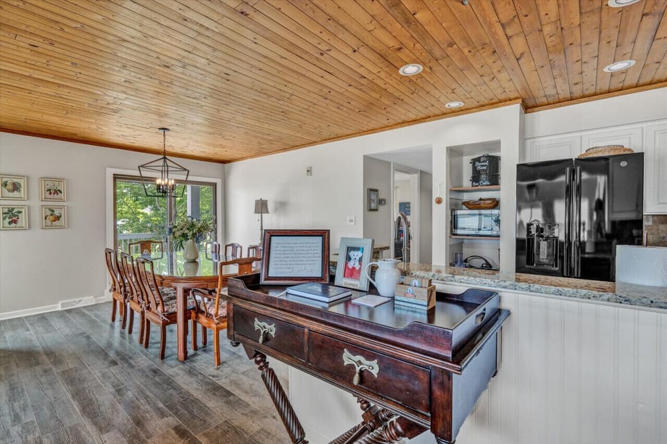 Savor your meals in a bright dining area with a view and ample seating for everyone.